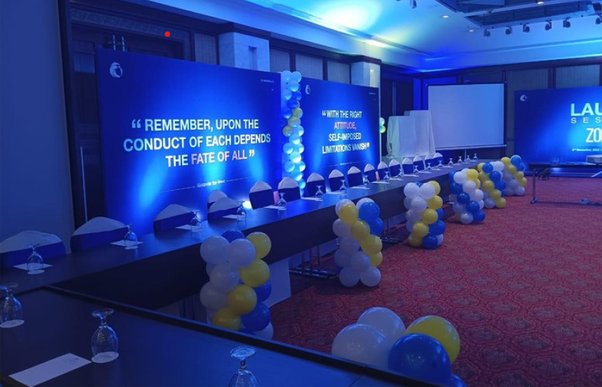 Corporate conference stage with blue lighting